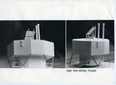 Arktisk stad i Resolute Bay
Modellfoto med text: new two-storey house