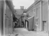 Gårdsinteriör Östra Ågatan 15, kvarteret Torget, Dragarbrunn, Uppsala 1908