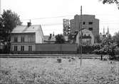 Flerbostadshus längs Vaksalagatan, kvarteret Oden Ygg, Uppsala,
under byggnation 1936