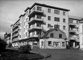 Bostadsrättsföreningen Islandsgården under byggnation, kvarteret Örnen, Östra Ågatan - Bäverns gränd, Uppsala oktober 1936. Delar av krogen 