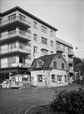 Bostadsrättsföreningen Islandsgården under byggnation, kvarteret Örnen, Östra Ågatan - Bäverns gränd, Uppsala 1936. Delar av krogen 