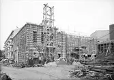 Uppsala stadsbibliotek och Centralbadets simhall under byggnation, Östra Ågatan, Uppsala november 1940