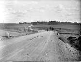Landskapsvy med väg, Albäck, Simtuna socken, Uppland 1933