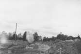 Enköping, Romområdet, kvarteret Anna och Eva, Fagerskogsgatan, intervallsprängning, mot väster, april 1955