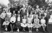 Skolklass 1958-59 med magister Gustaf Josefsson.
Centralskolan (nuv. Kyrkskolan) i Lindome.