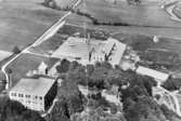 Flygfoto över Anderstorps fabriks spinneri och Eriksbergs färgeri, 1940-talet.