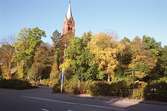 Fässbergs kyrka. Mölndalsbro i dag - ett skolpedagogiskt dokumentationsprojekt på Mölndals museum under oktober 1996. 1996_1098-1115 är gjorda av högstadieelever från Kvarnbyskolan 9C, grupp 5. Se även 1996_0913-0940, gruppbilder på klasserna 1996_1382-1405 samt bilder från den färdiga utställningen 1996_1358-1381.