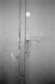 Byggnadsdetaljer: Dörrport med handtag, hösten 1994. Före detta spinneriet Bettyholm/Carlsfors/Forsåkers fabriker 