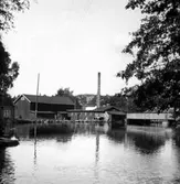 Kvarnfallet 31 vid Grevedämmet. Till höger ses Sågdalens järnvägsbro.