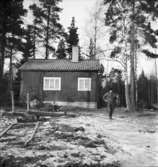 Björnsö skogsskifte
Skogsarbetare och hus
Exteriör
