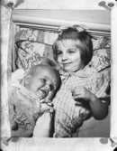 Reproduktion
Porträtt av två barn