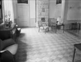 Rum med kakelugn
Interiör