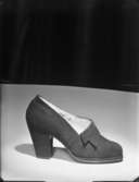 Sko
Annonskampanj för skor hösten 1948