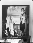 Modebild
Modellen fru Ohlsson med scharf i montage med brasa
Interiör