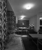 Valhall Hotell
Interiör, klubbrum med mönstrade tygstycken på väggen