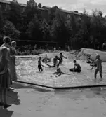 Parkområde
Plaskdamm med badande barn