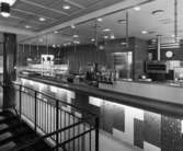 ICA - restaurang
Interiör, mosaikbeklädd bar vid trappräcke. I taket infällda spotlights