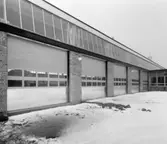 Portar
Exteriör, reservdelslager med skjutportar.