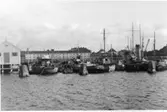 Oljefabrikens exteriör före omändringen i september 1946.
Lindholmsbron till höger på bilden före ombyggnaden