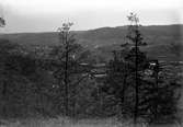 Utsikt över Huskvarna söderut. Vid horisonten skymtar tornet på Rogberga kyrka.