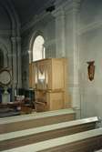 Kororgel flyttad från Arnäs kyrka i Västernorrlands län, till Holms kyrka. På bilden: orgeln på sin ursprungliga plats i Arnäs kyrka. Dnr. 423/2081.