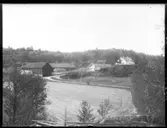 Vy som visar riksdagsman Anderssons gård i Intagan, Trollhättan