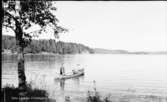Friluftsgården från Laxsjön med kanot  Steneby
