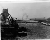 Arbete med muddring för nya kanalen genom Lilla Vassbotten   åren 1910-1916  Vänersborg