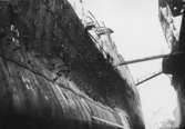 Bomskadat i Hamburgs hamn 28 juli 1943. Reparerades provisoriskt och hembogserdes till Sverige.