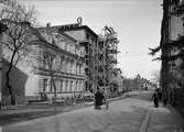 Flerbostadshus under byggnation, kvarteret Sigar, Skolgatan, Uppsala 1938