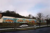 Graffiti längs Kvarnbygatan i Mölndal, år 2003.
