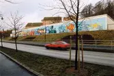 Graffiti längs Kvarnbygatan i Mölndal, år 2003.