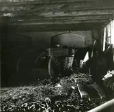 Kolningsredskap m.m. i bottenvåningen i gamla järnmagasinet, Ängskärs hamn.