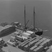 Timmerupplag på kaj