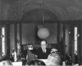 Wargöns AB.

Från jubileumsdagen, (75 år) söndagen den 19 juni 1949.
Vargöns kapell. Kantor Karl Johansson höjer taktpinnen och den förenade kapell- och Tunhems-kören sjunger Jag lyfter mina ögon upp till bergen. Prosten Kloo talar över episteltexten.