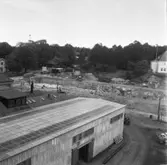 Wargöns AB. Byggnation av PM 5 1959-60. Foto och påförd text av dåvarande ritkontorschefen Ragnar Söderberg.

Den 8/7 1959 var sprängningen klar och platsen för PM 5 låg klar att tagas i bruk av SIAB