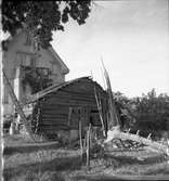 Vedbod på gården Munken  Bomarken  Nössemark