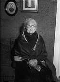 Åldrig kvinna i hemmiljö, sannolikt Uppsala 1933