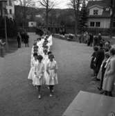 Konfirmation i Huskvarna kyrka på 1960-talet.