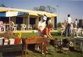 Grillning under Bygdetravet på Åby 1992. 

Blandade bilder insamlade inför dokumentation av Åby Stallbacke och Stallgårdar 2015.