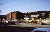 Vägarbete i Mölndal år 1968. Svalöfsbolaget (Allmänna Svenska utsädesaktiebolaget) ses till vänster.