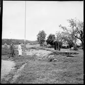 Utgrävning av urna. Svenstorp