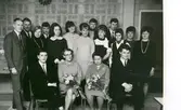 Klassträff för elever födda 1944, Brattåsskolans matsal 1969. Bakre raden från vänster: 1. Morgan Andersson, 2. Lars Johansson, 3. Lillemor Wettervik, 4. Arne Eriksson, 5. Mona Ahlqvist, 6. Maj-Lis Flink, 7. Eva Jonasson, 8. Lars-Erik Persson, 9. Anita Ingvarsson, 10. Lennart Svensson, 11. Eva Pettersson, 12. Inga-Britt Andersson och 13. Marie-Louise Larsson.
Sittande från vänster: 1. Kent Rasmusson, 2. lärare Jessie Thölén (1903 - 2001), 3. lärare Greta Hernqvist (1895 - 1984) och 4. Bernt Larsson.