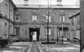 Trähus med innergård vid Klostergatan 31 i Jönköping. JMWS kassör Ljungberg bodde här och hade del i fastigheten.