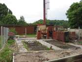 Resterna av ett rivet växthus tillhörande SiS ungdomshem Fagared i Lindome. Fastighetsbeteckning är Fagered 3:1. Fotografi taget den 29 juni 2012. Byggnadsdokumentation under rivning.