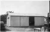 Vägstation D5, Flen. Förrådsbyggnad.