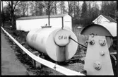 Vägstation F5, Unnaryd, färjeläget Bolmsö. Drivmedelscistern, märkt 