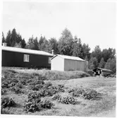 Vägstation G4, Bergsnäs. Förrådsbyggnad bakom huvudbyggnaden.