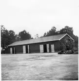 Vägstation K4, Pukavik. Förrådsbyggnad.