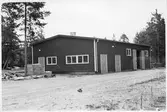 Vägstation R5, Hova. Förrådsbyggnad.